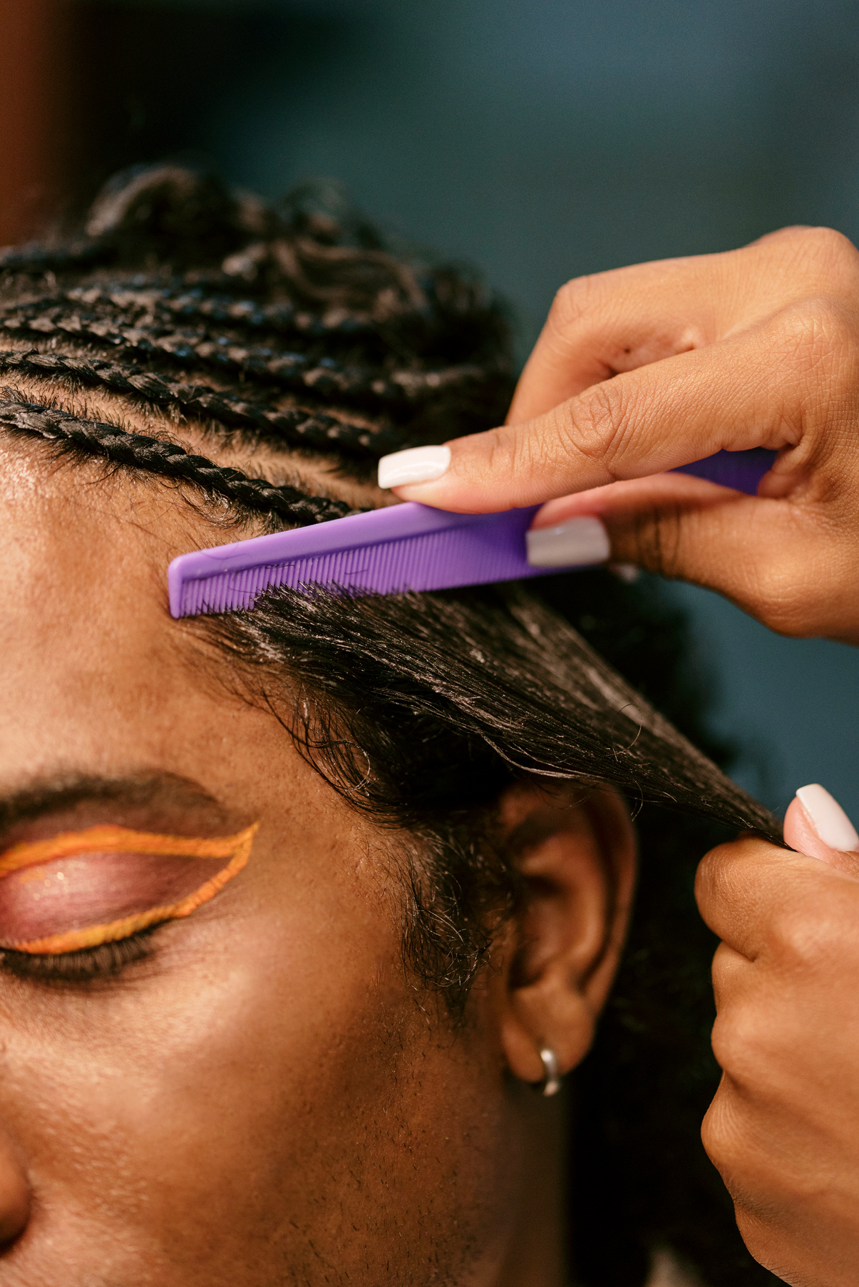 Man with Curly Hair Getting Braids